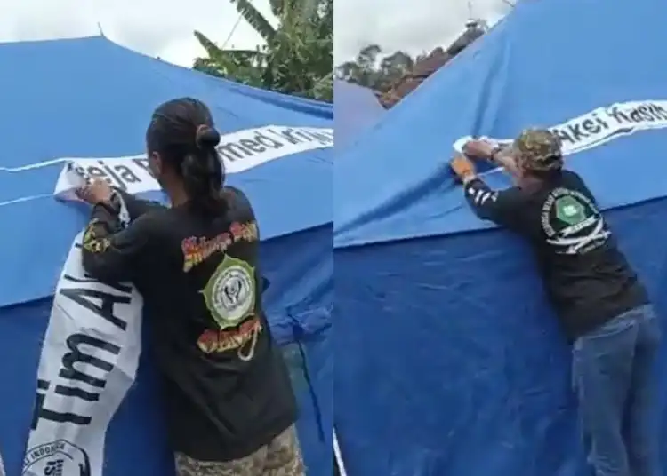 Tangkapan layar video pencopotan logo Tim Aksi Kasih GRII di Posko Bantuan Gempa Cianjur.