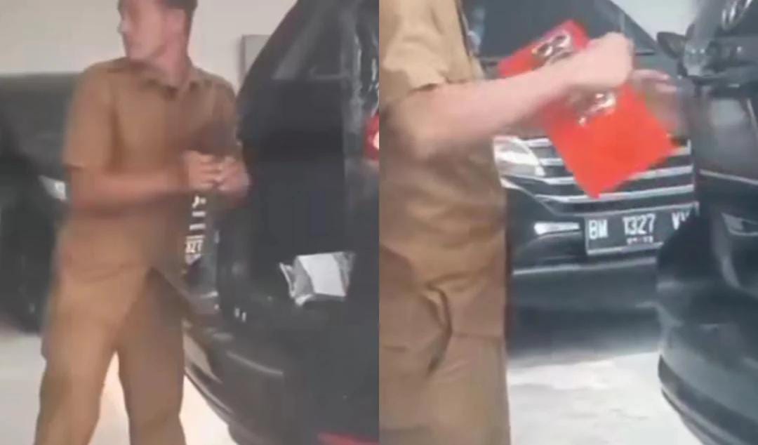 PNS mengganti Plat Mobil Dinas