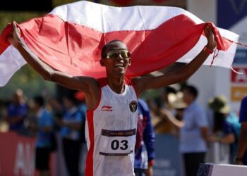 Agus Prayogo merebut medali emas kedua Indonesia di SEA Games 2023. (REUTERS/JEREMY LEE)
