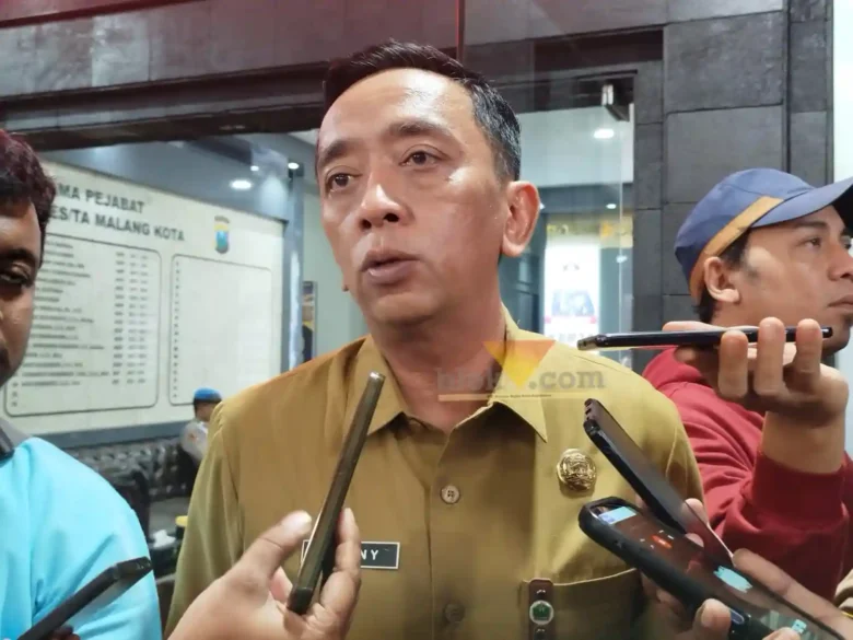Kepala Dinsos-P3AP2KB Kota Malang, Donny Sandito saat bertemu awak media di Polresta Makota (blok-a.com / Yogga Ardiawan)