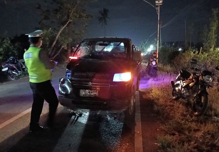 Olah TKP kecelakaan antara mobil Pikup kontra Motor Vixion di Jalan Raya Pesanggaran, Jumat (14/3/2025).(blok-a.com/Kuryanto)