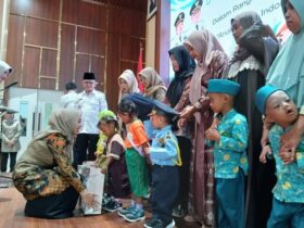 Pembagian makanan bergizi di Auditorium Mpu Sindok, Komplek Kantor Bupati Pasuruan, Rabu (23/7/2025).