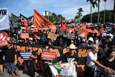 Massa aksi demo besar-besaran di Manila, Filipina, Minggu (21/9/2025) (Foto: Ted Aljibe/AFP)
