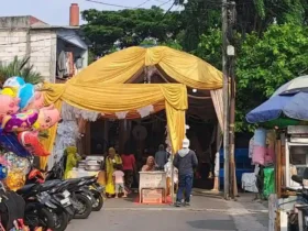 Ilustrasi: hajatan hingga menutup akses jalan (foto: kompas)