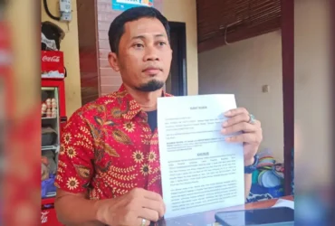 Kuasa Hukum pelapor Muhammad Ridlwan saat menunjukan surat kuasa (foto: ist)