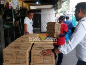 Distribusi MinyaKita di salah satu stan Pasar Besar SP2KP Mojosari (foto: Blok-a.com/Syahrul Wijaya)