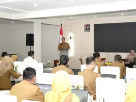 Sekda Kabupaten Malang, Budiar saat menghadiri Forum Komunikasi Implementasi Strategi Penguatan Rekrutmen dan Reaktivasi Peserta untuk Mewujudkan UHC Berkualitas Tingkat Kabupaten Malang (foto: dok. Prokopim)