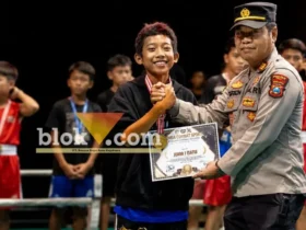 Muhammad Dewa Fortuna, siswa SDN Bendogerit 1 Blitar, juara 1 tinju di Kediri. Atlet catur yang buktikan bakat bisa di dua dunia berbeda (foto: blok-a.com/Fajar)