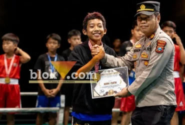 Muhammad Dewa Fortuna, siswa SDN Bendogerit 1 Blitar, juara 1 tinju di Kediri. Atlet catur yang buktikan bakat bisa di dua dunia berbeda (foto: blok-a.com/Fajar)